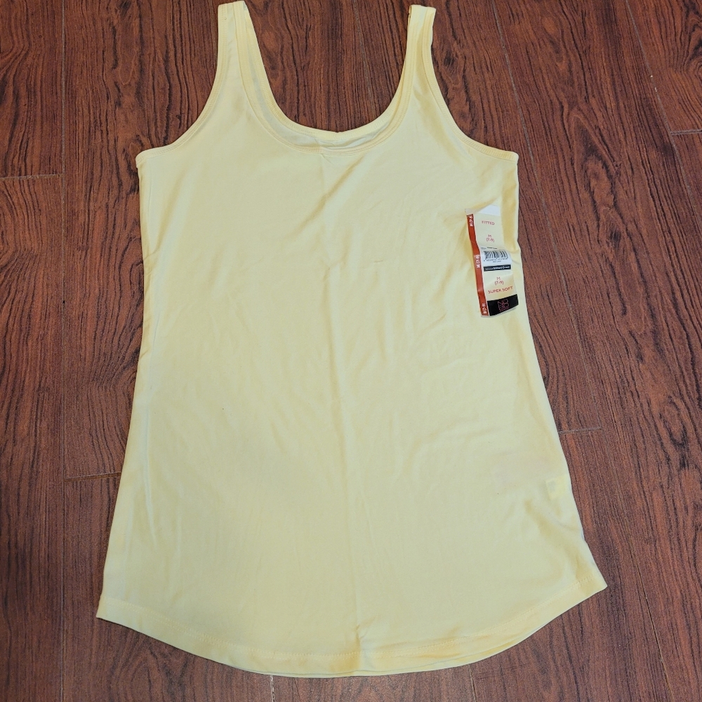 Yellow tank top size med (7-9)
